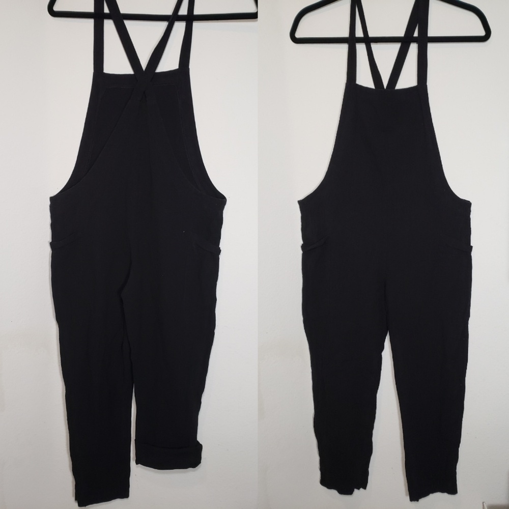 Black romper/ overalls. Cotton blend. Size small
